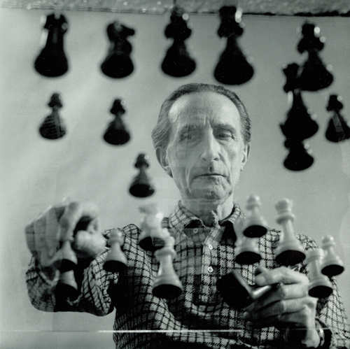 Photo of Marcel Duchamp playing chess